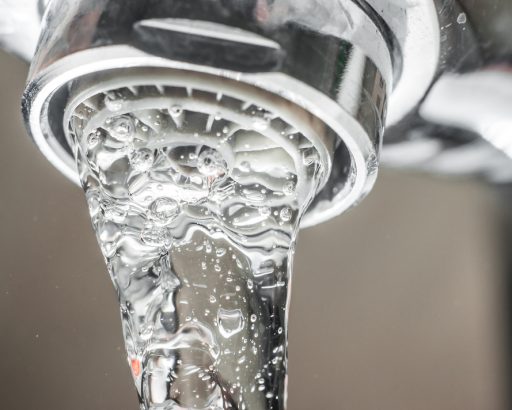 Frozen,Water,Stream,From,A,Tap,Close-up.,Aerator,Operation,For